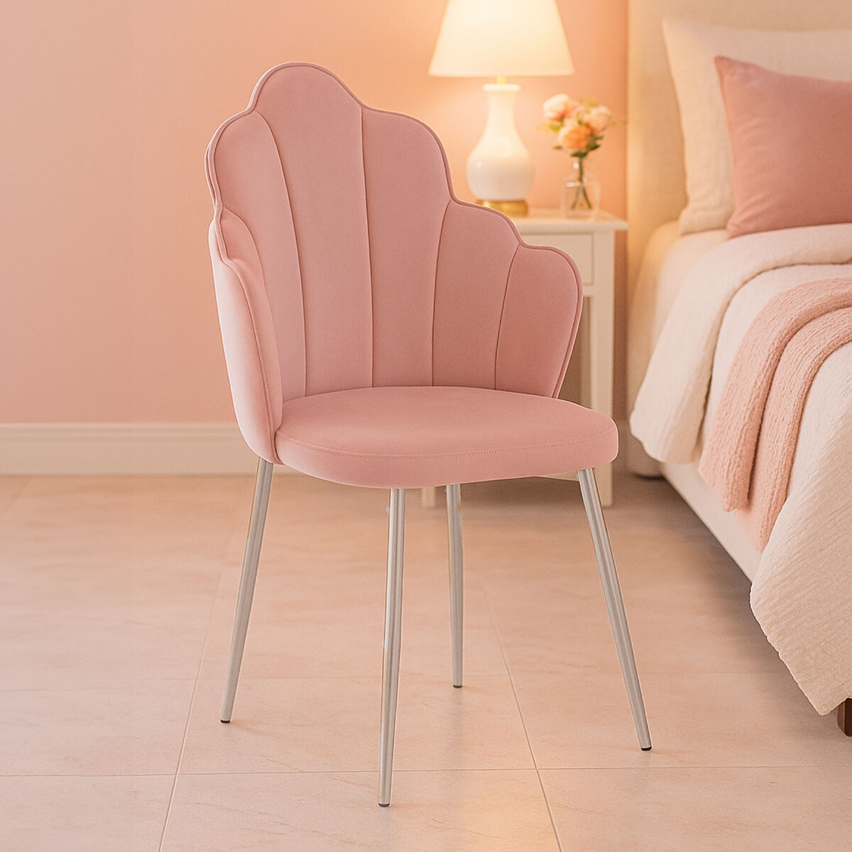 Pink shell-back chair in a bedroom setting with a bed and lamp in the background.