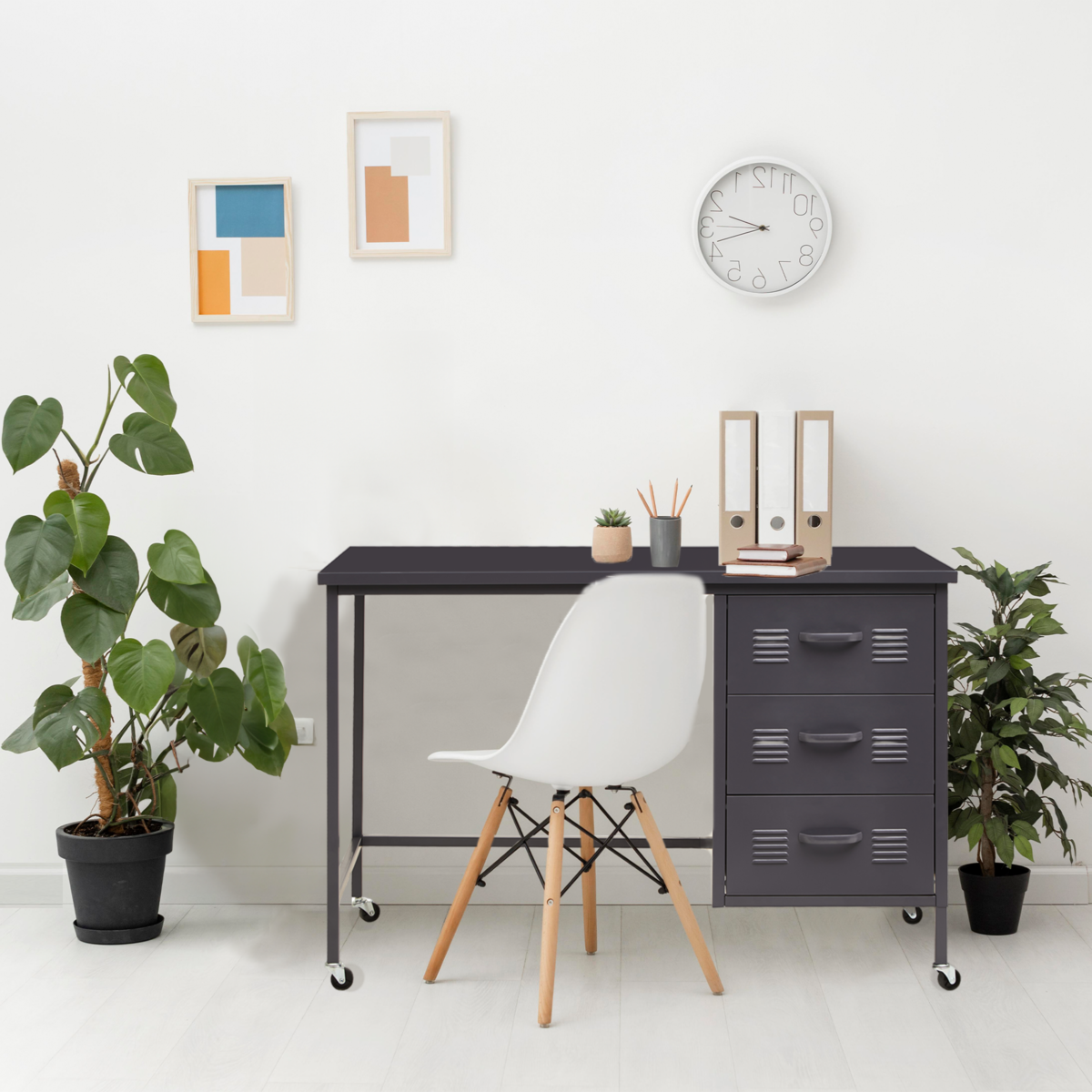 Modern office setup with a desk, chair, and decorative elements.