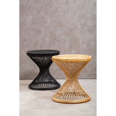 Two woven side tables, one black and one natural wood, against a gray wall.