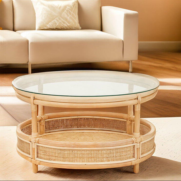 Modern living room with a beige sofa, glass coffee table, and decorative elements.