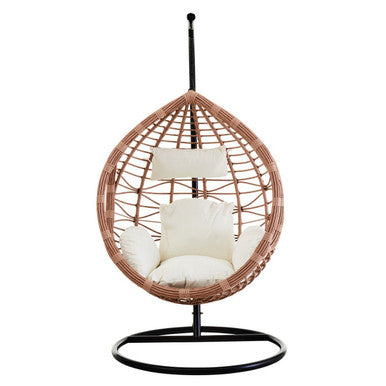 Wicker hanging chair with white cushions on a white background