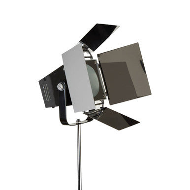 Studio light with adjustable shade on a white background