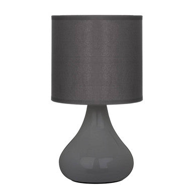 Gray table lamp with a dark gray shade on a white background
