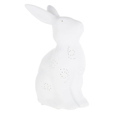 White rabbit-shaped night light on a white background