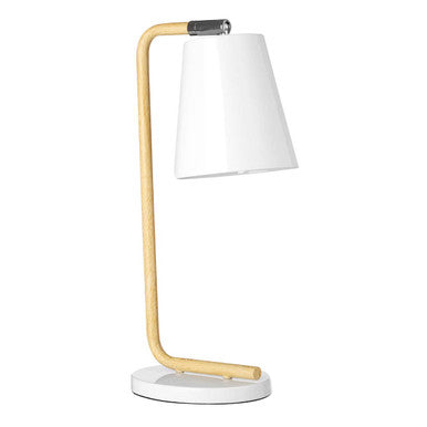 Table lamp with white shade and gold metal base on a white background