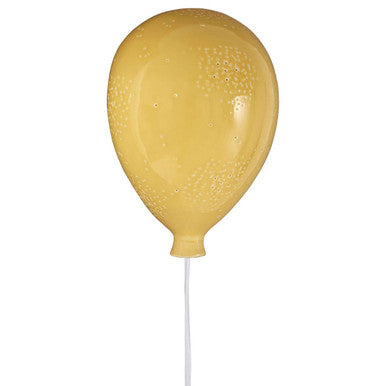 Yellow balloon on a stick against a white background