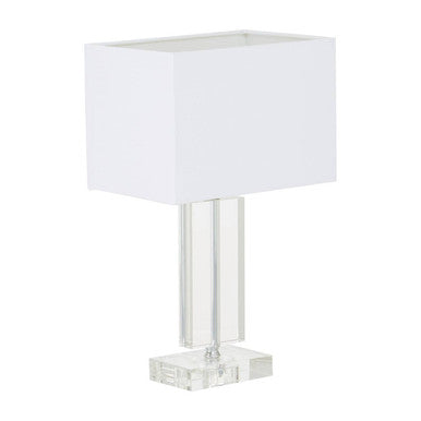 Table lamp with a white square shade and clear rectangular base on a white background