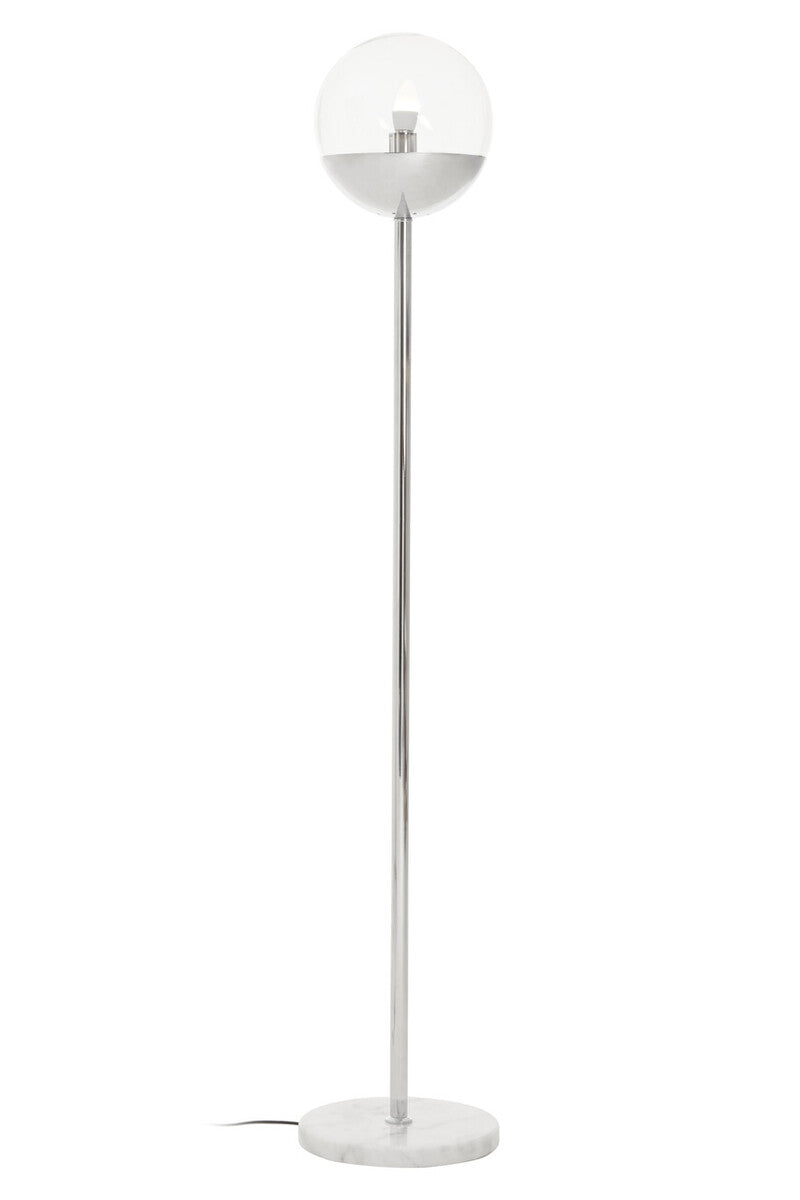 Floor lamp with a glass globe shade on a white background