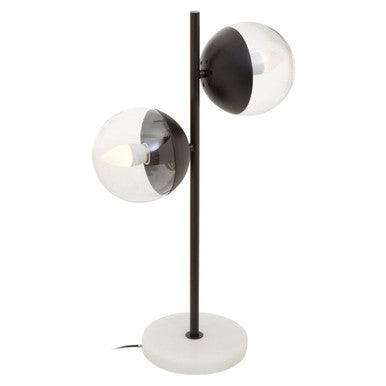 Modern table lamp with three spherical shades on a white background