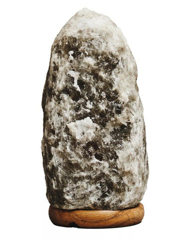 Decorative stone with a wooden base on a white background
