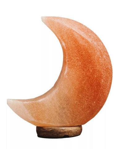 Crescent-shaped salt lamp with a wooden base on a white background