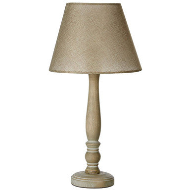 Table lamp with a beige shade and wooden base on a white background
