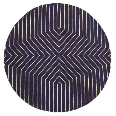 Round rug with a geometric pattern on a white background