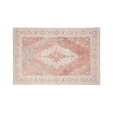 Decorative pink and beige area rug with a geometric pattern on a white background