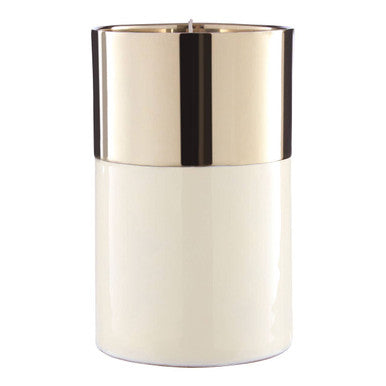 Cylindrical cream jar with gold cap on a white background