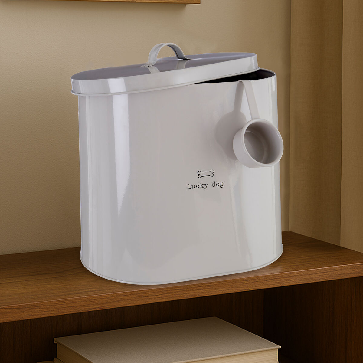 White pet food container with a small cup on a wooden shelf