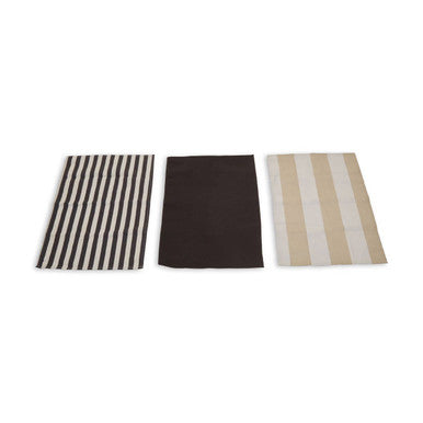 Three rectangular towels with different patterns on a white background