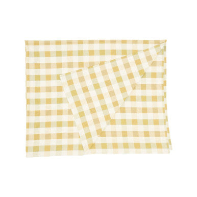Yellow and white checkered fabric on a white background