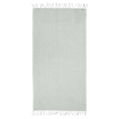 Light gray rug with white fringe on a white background