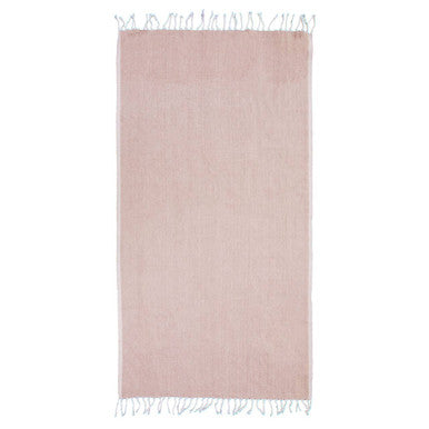 Pink rug with white fringe on a white background