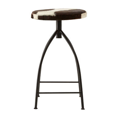 Bar stool with black and white cowhide seat on a white background