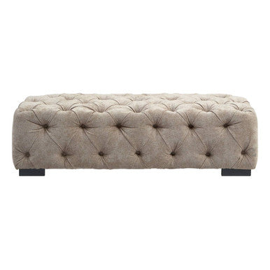 Beige tufted bench on a white background