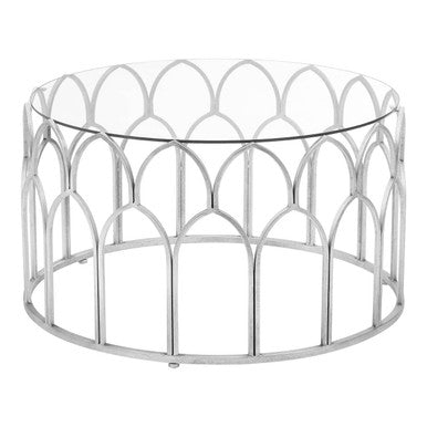 Decorative metal table with a glass top on a white background