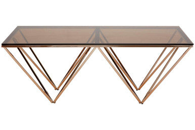 Glass table with rose gold metal frame on a white background