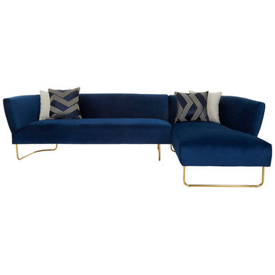 Blue sectional sofa with gold legs on a white background