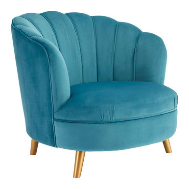 Blue velvet armchair with gold legs on a white background