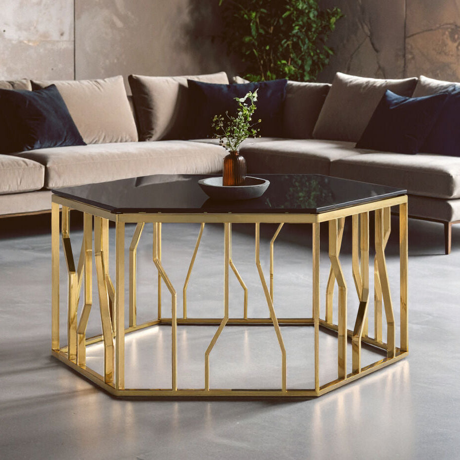 Modern living room with a hexagonal coffee table and sectional sofa.