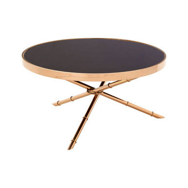 Round table with black top and gold metal legs on a white background
