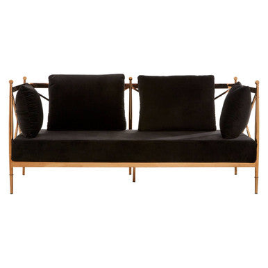 Black sofa with gold frame and black cushions on a white background