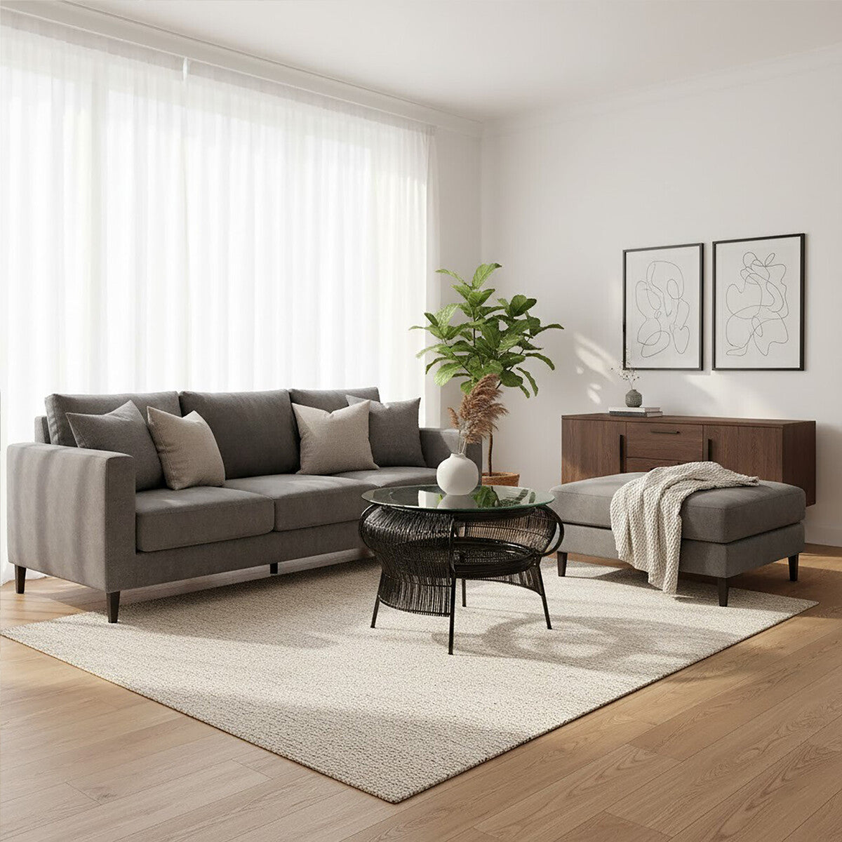 Modern living room with gray sectional sofa, coffee table, and decorative elements.