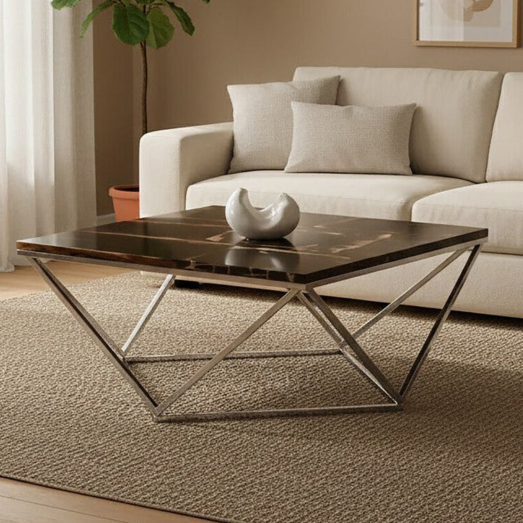 Modern living room with a beige sectional sofa, coffee table, and decorative elements.