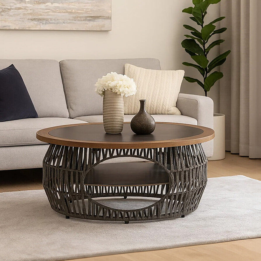 Living room with a gray sofa, wooden coffee table, and decorative items.