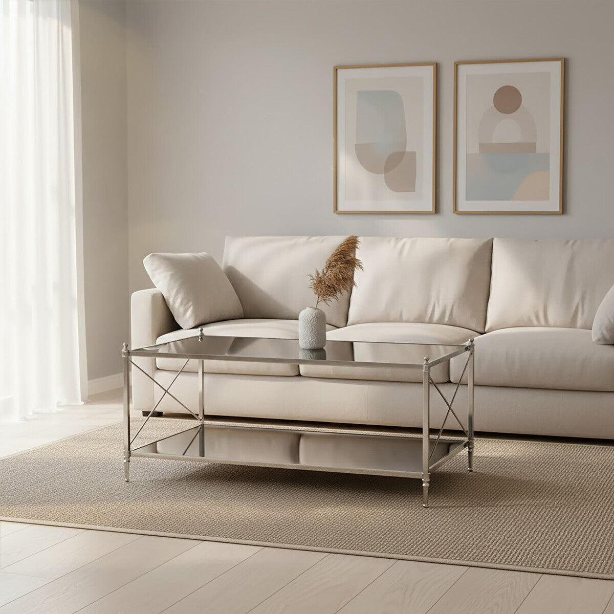 Modern living room with a beige sofa, glass coffee table, and abstract art on the wall.