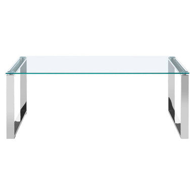 Glass table with metal frame on a white background