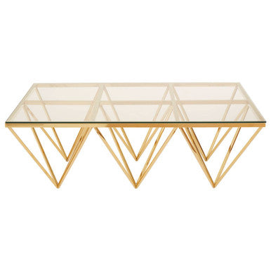 Glass coffee table with gold geometric base on a white background