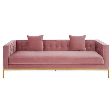 Pink sofa with gold legs on a white background