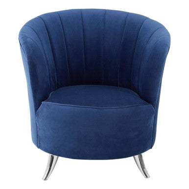 Blue velvet armchair with chrome legs on a white background