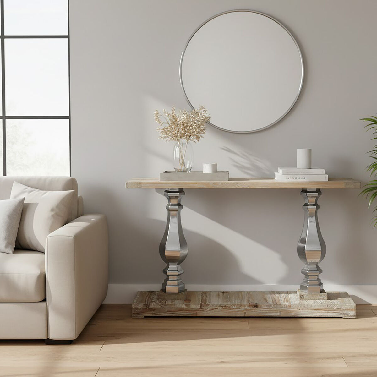 Modern living room with a console table, mirror, and sofa.