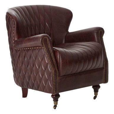 Brown leather armchair with quilted pattern on a white background
