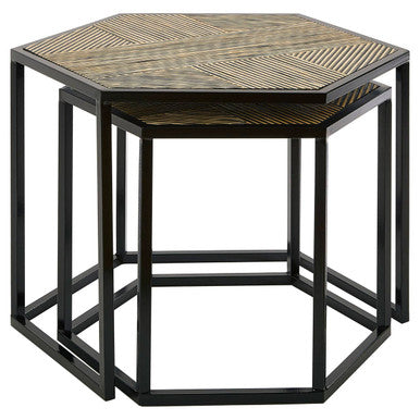 Hexagonal side table with wicker top and black metal frame on a white background