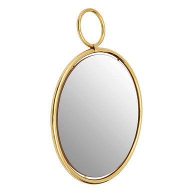Gold-framed oval mirror on a white background