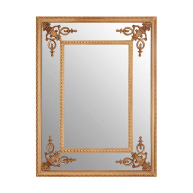 Decorative gold-framed mirror on a white background