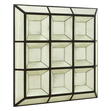 Decorative wall mirror with geometric glass design on a white background