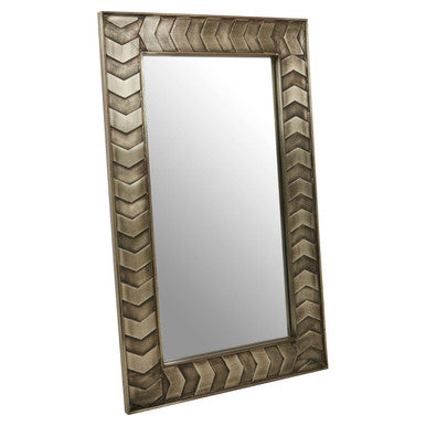 Rectangular mirror with decorative chevron patterned frame on a white background