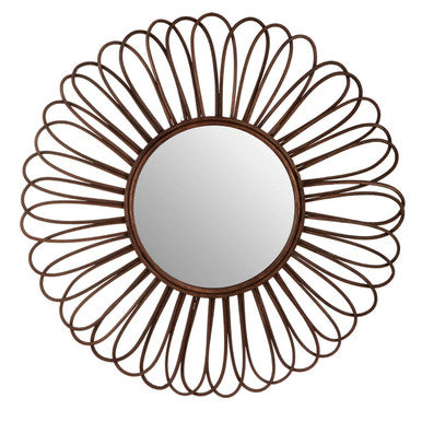 Decorative wall mirror with sunburst design on a white background