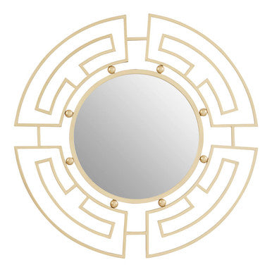 Decorative round mirror with gold geometric frame on a white background